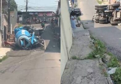 Caminhão betoneira tomba ao tentar subir rua, em Manaus